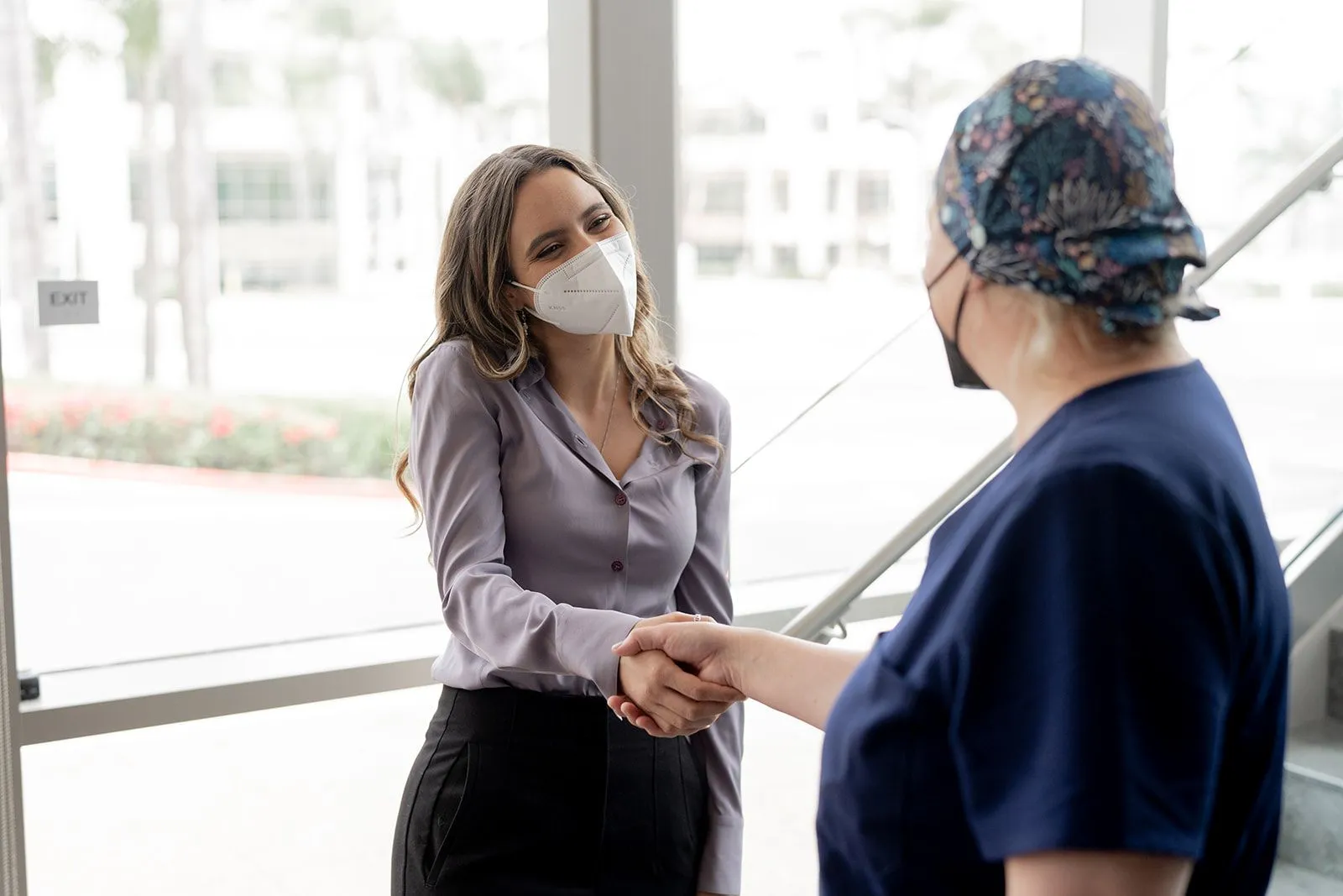 Patient shaking ivy fertility doctors hand
